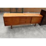 A BRAMIN OF DENMARK, MID CENTURY DANISH TEAK SIDEBOARD ENCLOSING TWO CUPBOARDS AND FOUR LONG