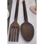 TWO LARGE WOODEN WALL DECORATIONS OF A FORK AND SPOON