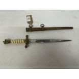 A NAZI GERMANY WWII KRIEGSMARINE DAGGER AND SCABBARD, 25.5CM BLADE WITH ACID ETCHED DECORATION