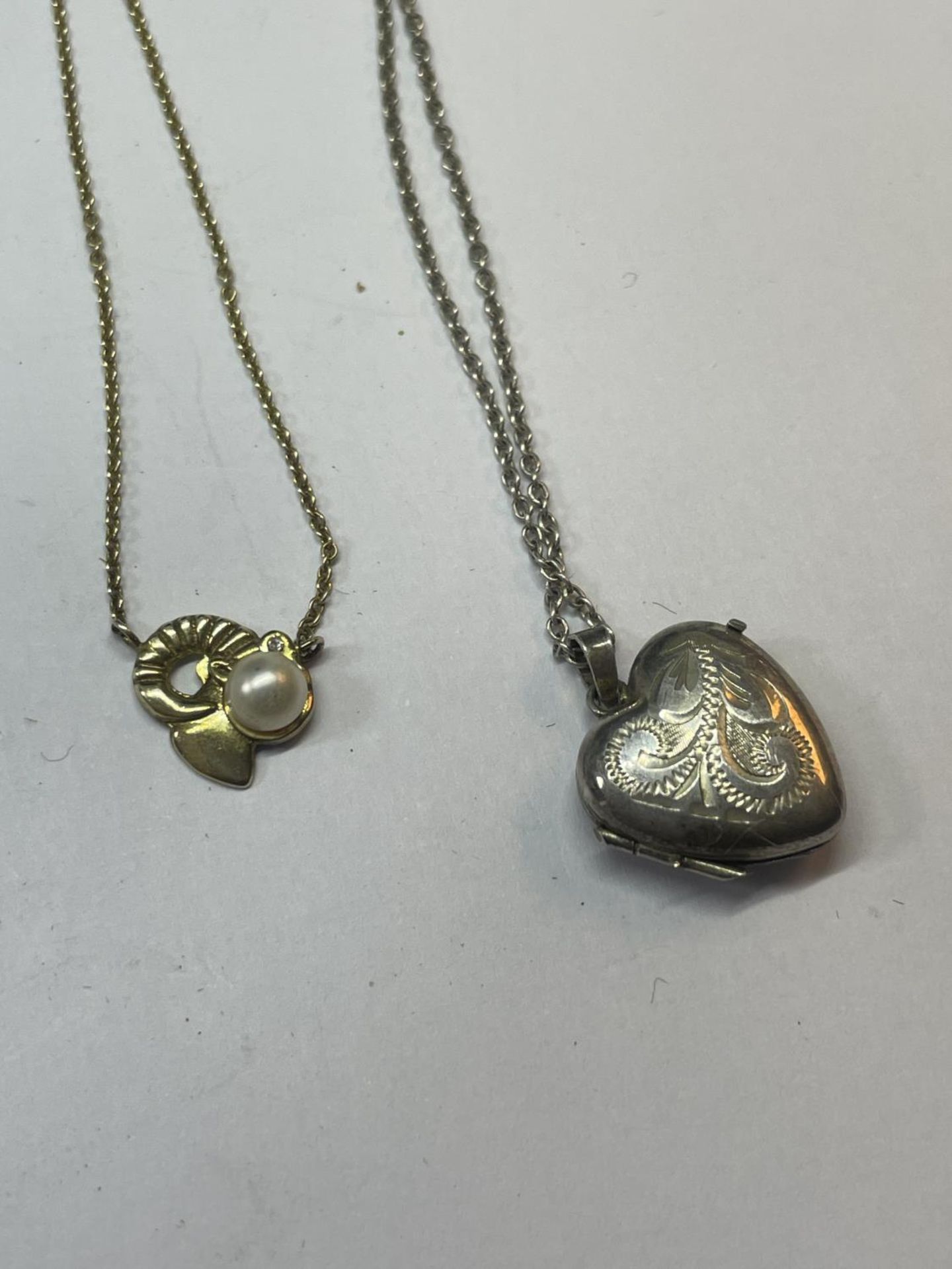 FOUR SILVER NECKLACES WITH PENDANTS - Image 3 of 3