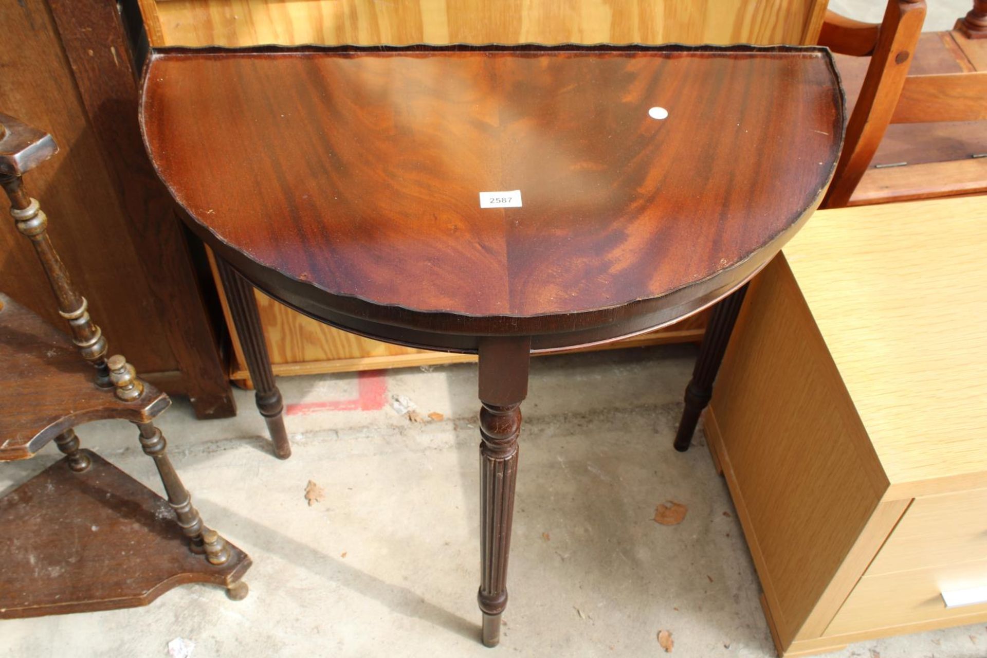 A MODERN MAHOGANY DEMI-LUNE HALL TABLE, 30" WIDE