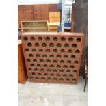 A MODERN FREE STANDING 68 BOTTLE WINE RACK, 49.5" WIDE