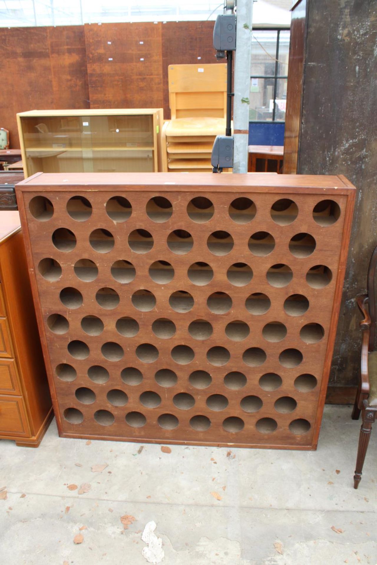 A MODERN FREE STANDING 68 BOTTLE WINE RACK, 49.5" WIDE