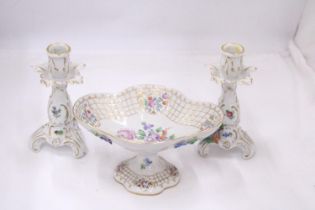 A VINTAGE FLORAL COMPOTE PLUS A PAIR OF PORCELAIN CANDLESTICKS