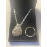 TWO MARKED SILVER ITEMS TO INCLUDE A CHAIN WITH CLEAR STONE BOXING GLOVE PENDANT AND A HEART