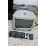 A RETRO APPLE IMAC WITH KEYBOARD