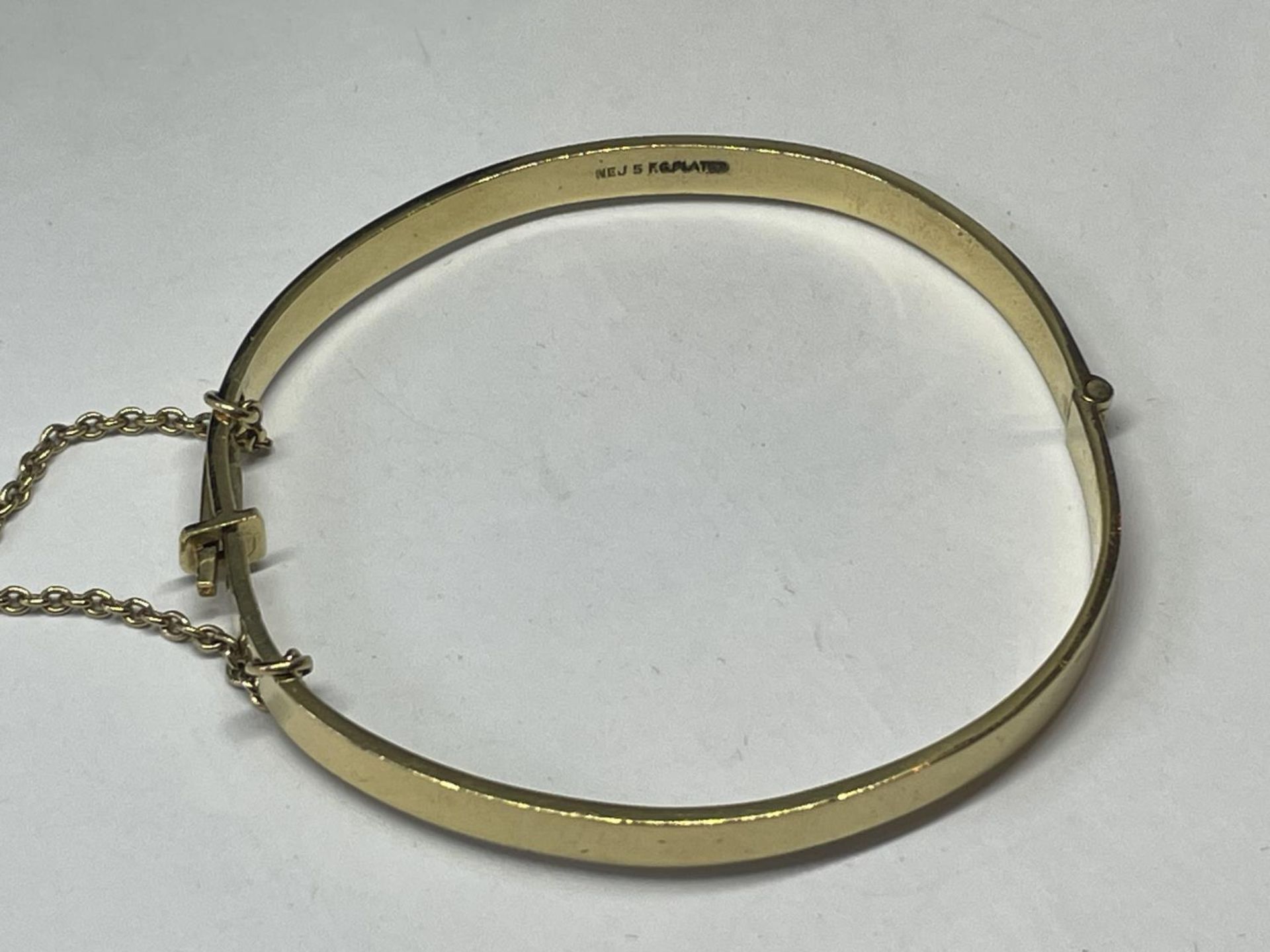 A GOLD PLATED BANGLE - Image 2 of 2