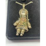 A SILVER DOLL NECKLACE IN A PRESENTATION BOX