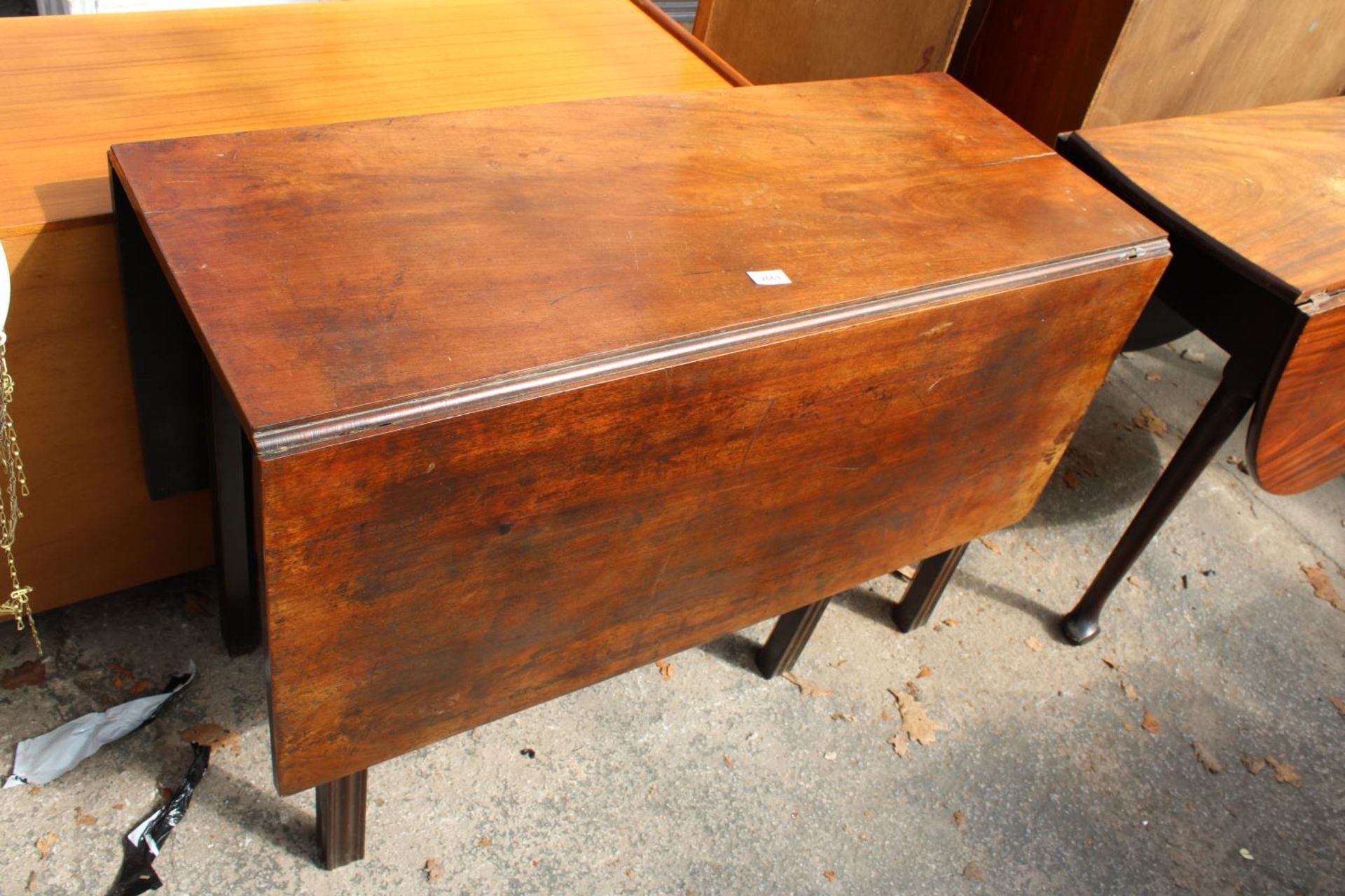 A 19TH CENTURY MAHOGANY DROP-LEAF DINING TABLE, 51" X 42" OPENED