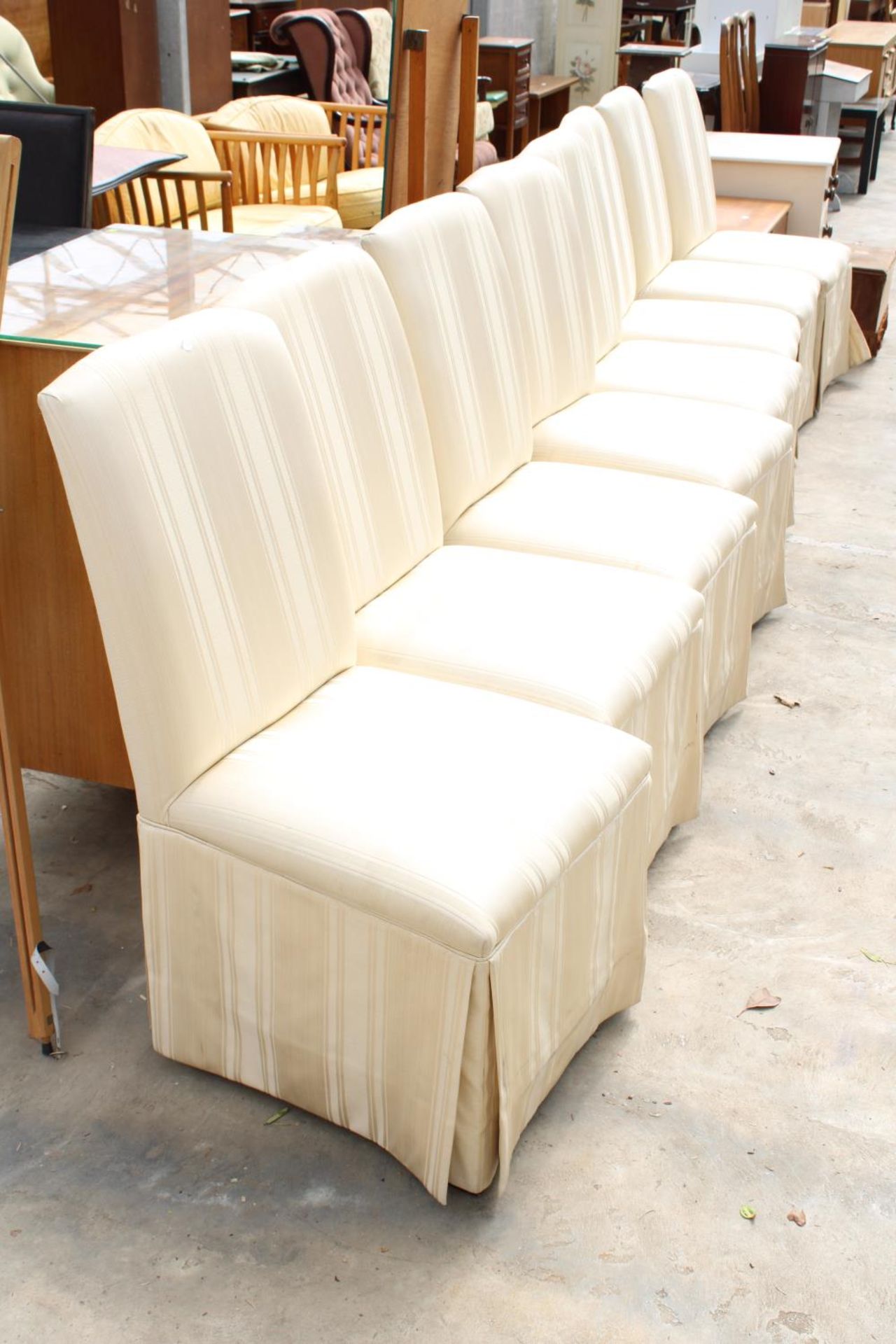 A SET OF EIGHT MODERN UPHOSTERED AND SKIRTED DINING CHAIRS - Image 2 of 3