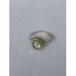 A 14CT GOLD RING WITH A PERIDOT GEMSTONE, SIZE N, WEIGHT 1.65 G