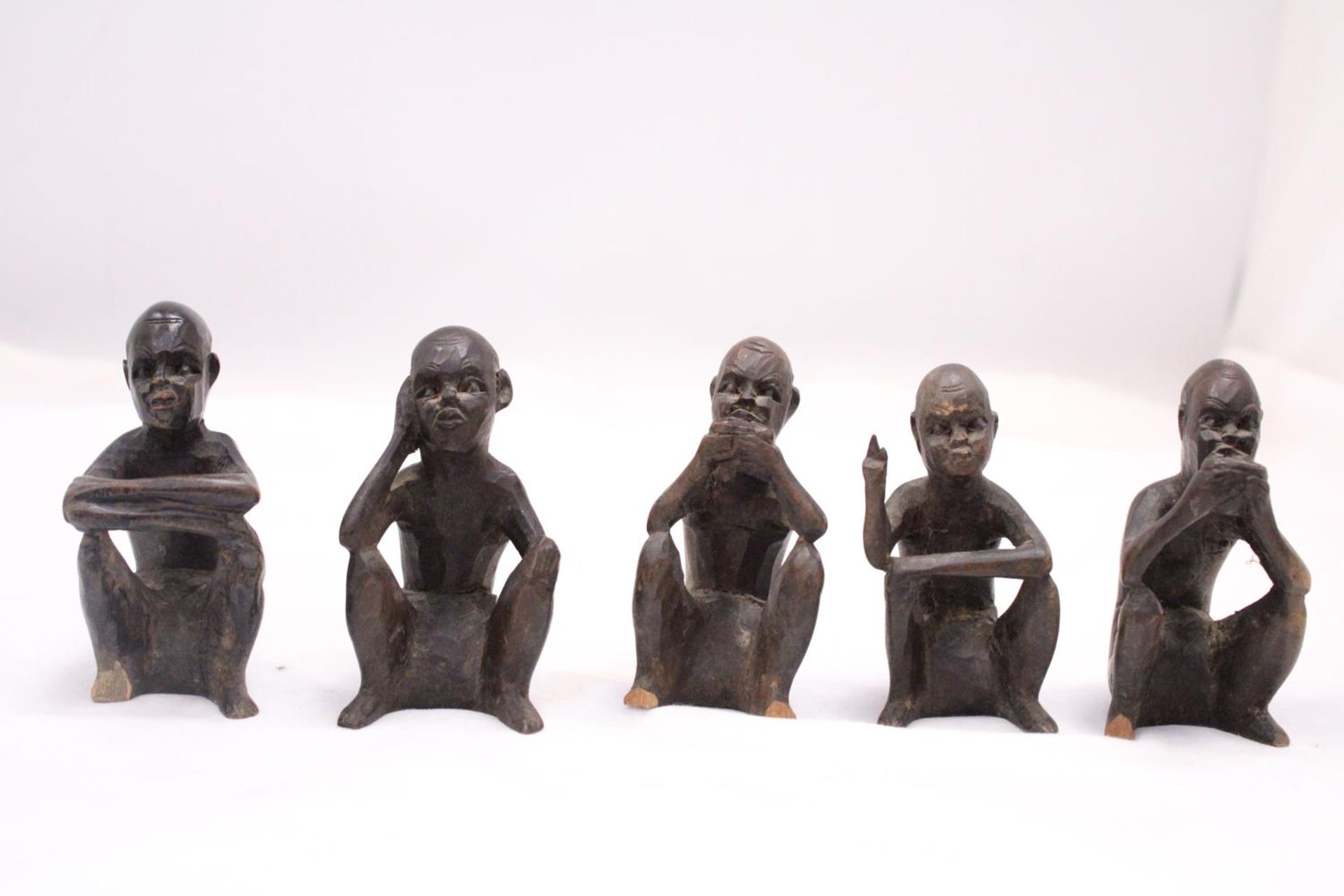 A COLLECTION OF FIVE VINTAGE WOODEN AFRICAN FIGURES