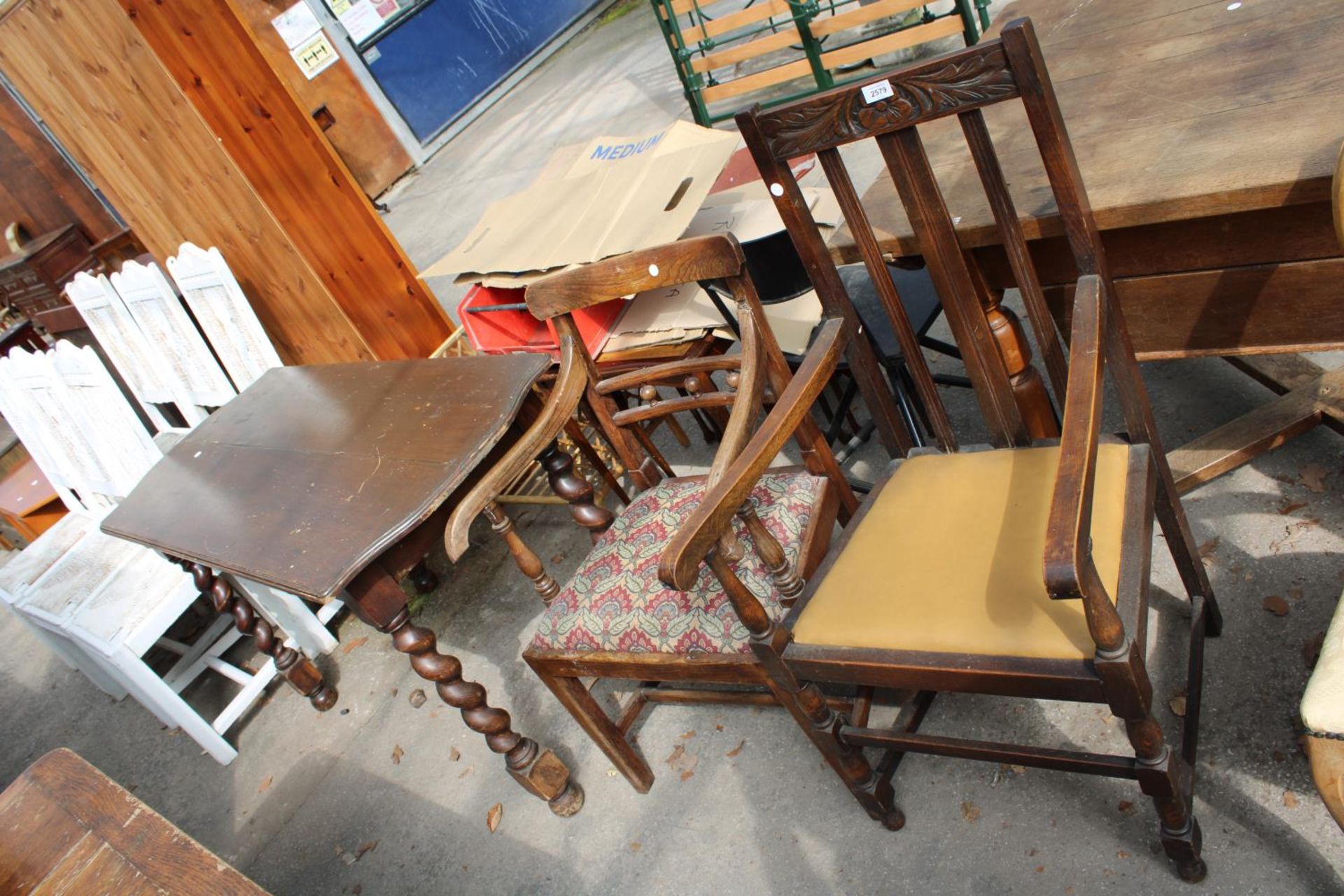 A COUNTRY ELM CARVER CHAIR AND OAK CARVER CHAIR