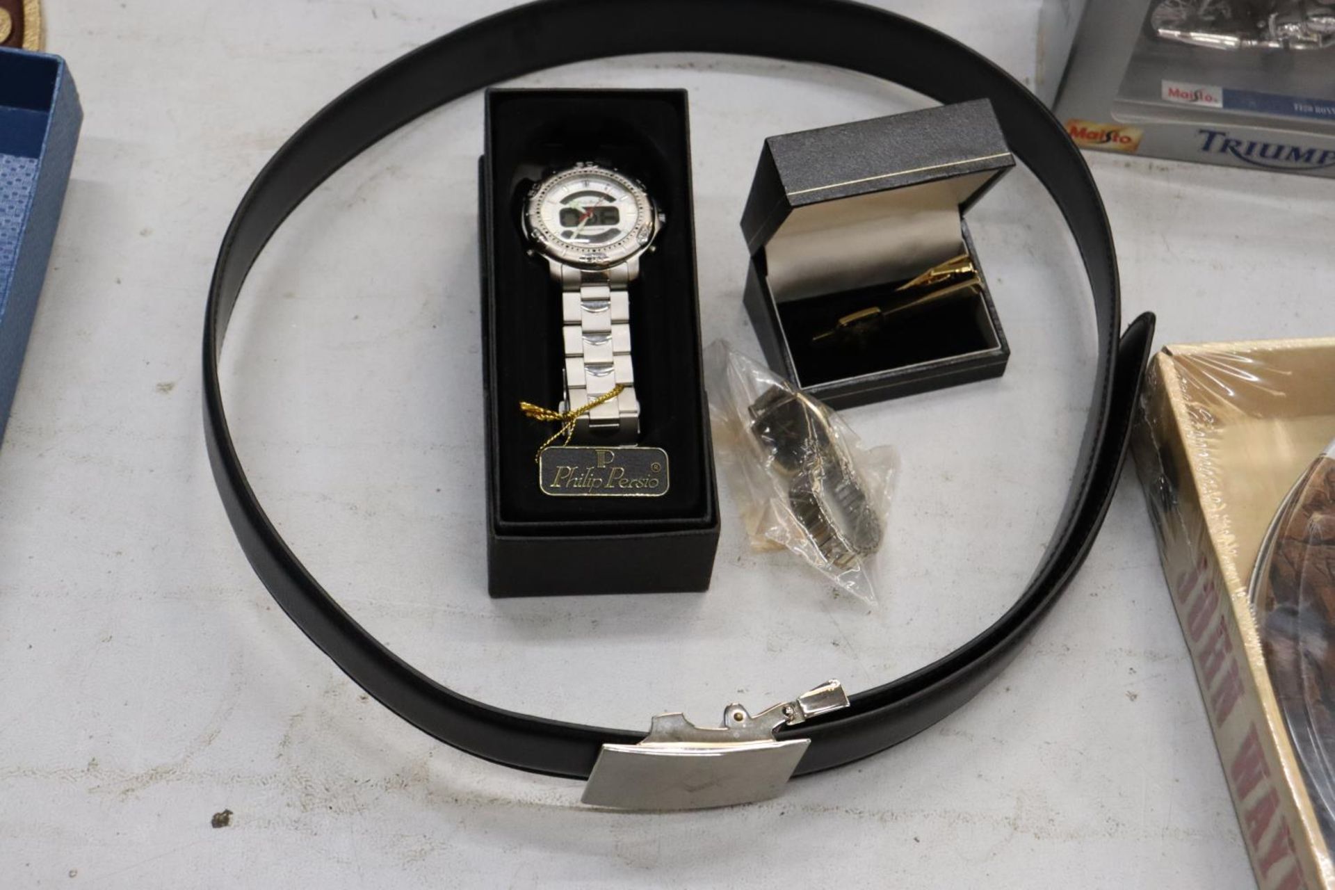 TWO MASONIC ITEMS TO INCLUDE A 'JOHN BRUNNER LODGE' BELT AND A TIE CLIP, PLUS TWO WRISTWATCHES