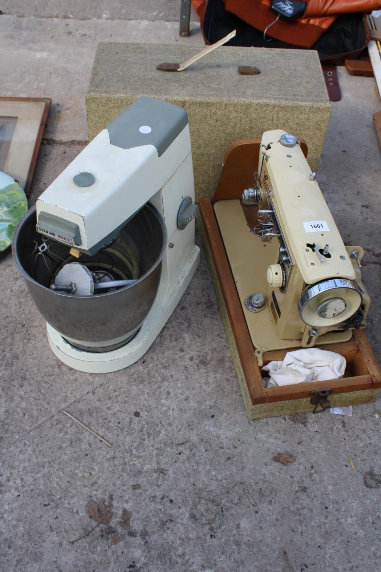 A RETRO KENWOOD FOOD MIXER AND A CRESTA SEWING MACHINE WITH CARRY CASE