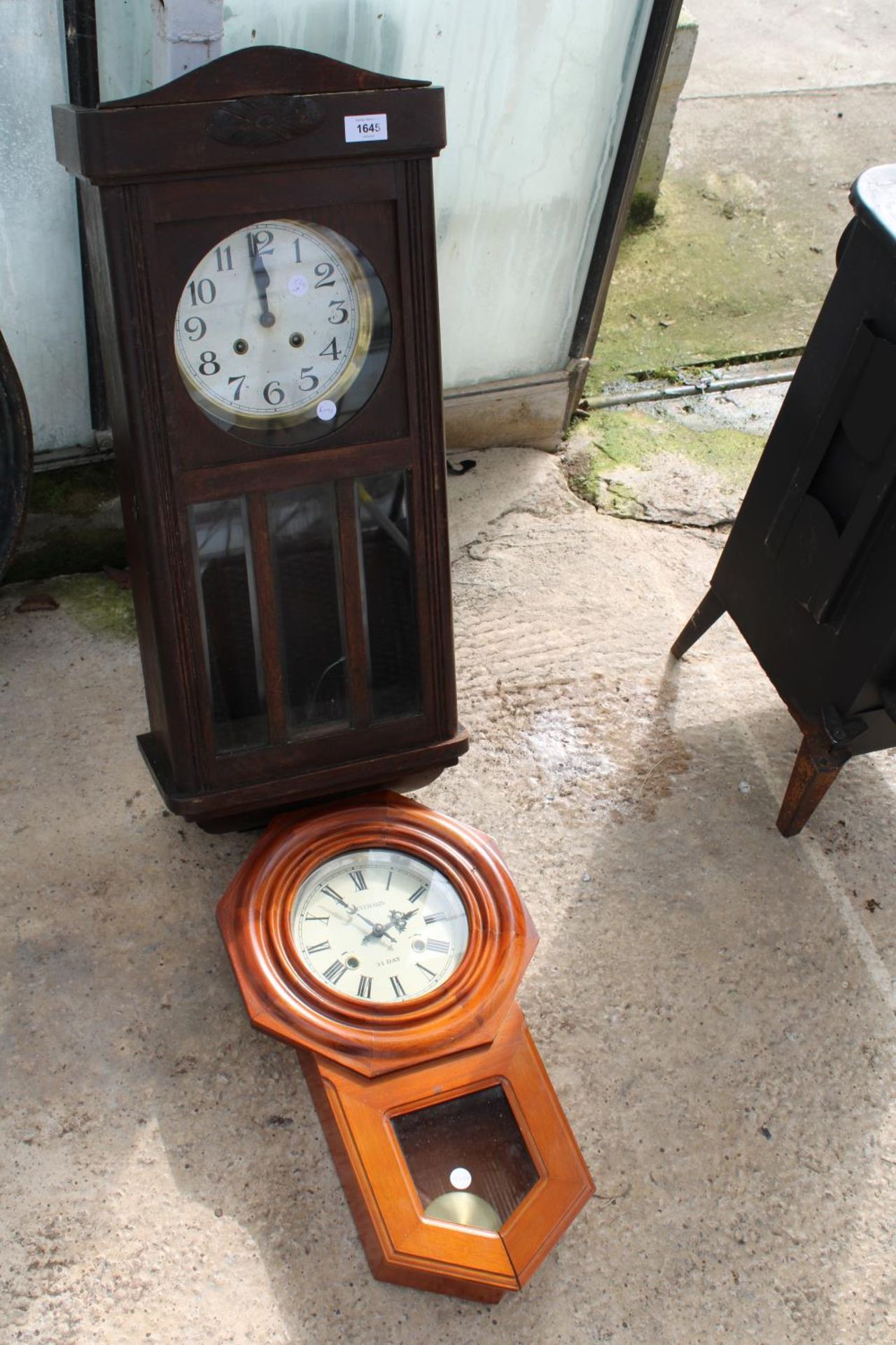 TWO CHIMING WALL CLOCKS TO INCLUDE AN OAK CASED EXAMPLE
