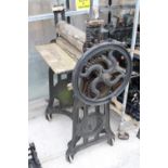 A VINTAGE CAST IRON AND WOODEN MANGLE BEARING THE NAME 'THE HERO MACHINE'