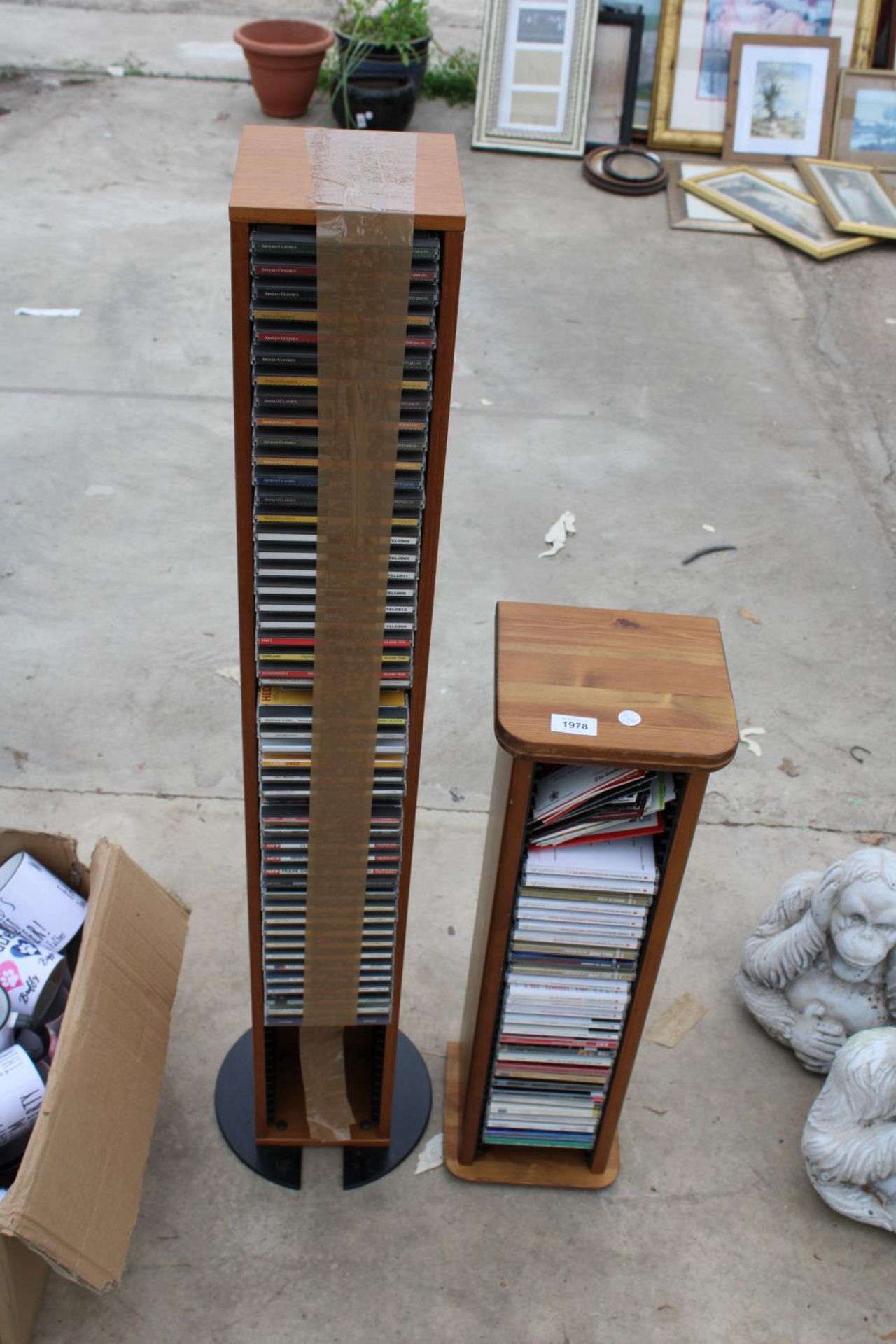 TWO CD RACKS AND A LARGE ASSORTMENT OF CDS