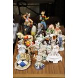 A COLLECTION OF FIGURES TO INCLUDE DOGS, RABBITS, A PENGUIN, STAFFORDSHIRE STYLE, CLOWNS, ETC