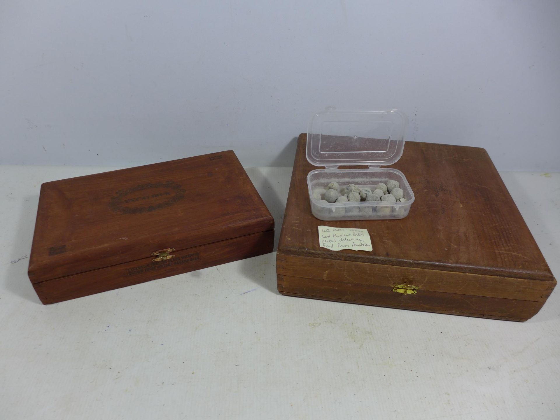 A BOX OF 17TH AND 19TH CENTURY LEAD MUSKET BALLS, TWO WOODEN BOXES