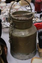 A VINTAGE MILK CHURN - APPROXIMATELY 29CM