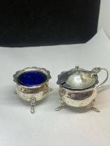 TWO HALLMARKED BIRMINGHAM SILVER SALTS WITH BLUE GLASS LINERS