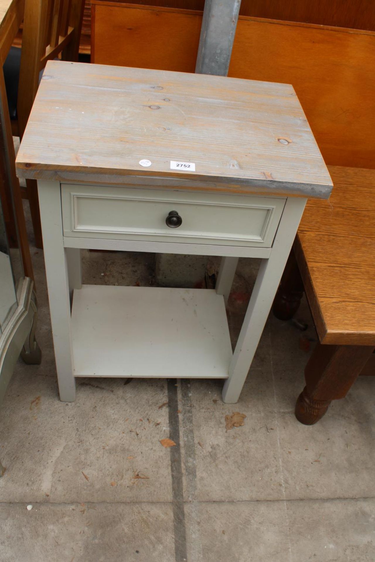 A MODERN PAINTED BEDSIDE TABLE WITH SINGLE DRAWER