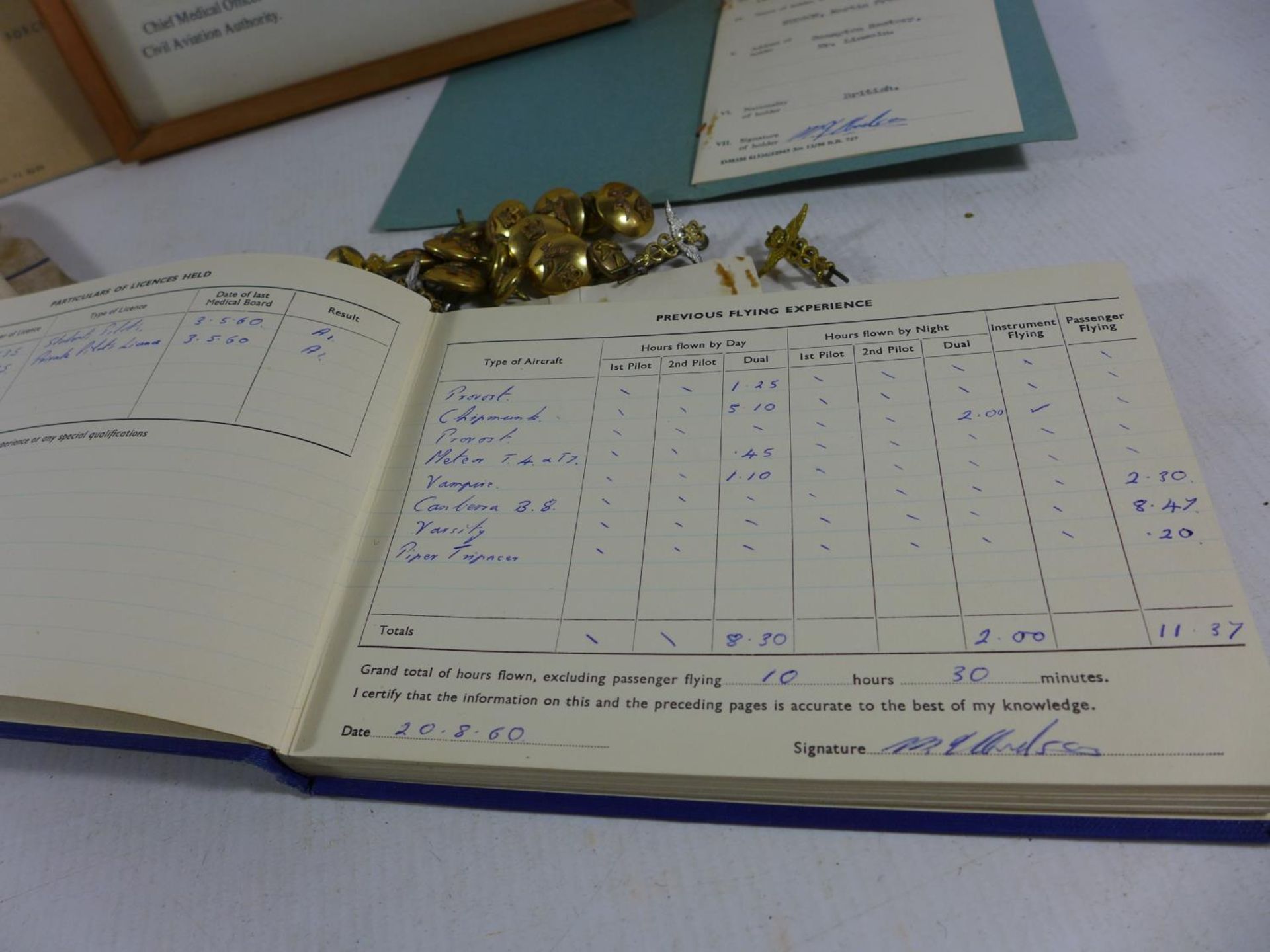 A COLLECTION OF RAF EPHEMERA FROM FLIGHT LIEUTENANT M.F.HUDSON COMPRISING OF BUTTONS, PILOTS LOG - Image 4 of 5