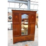 AN EDWARDIAN MAHOGANY AND INLAID MIRROR DOOR WARDROBE WITH TWO DRAWERS TO BASE, 62" WIDE