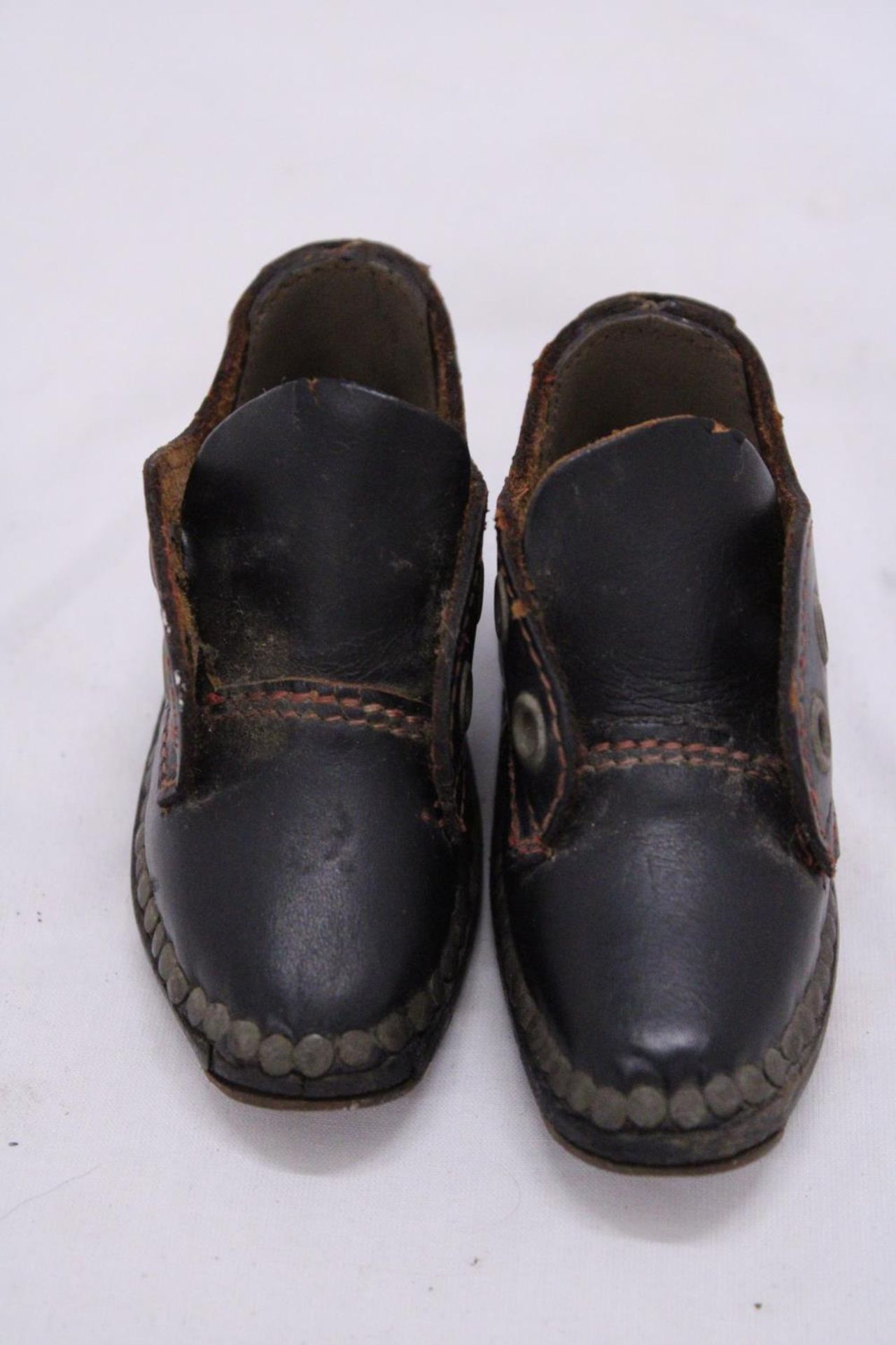 A PAIR OF VICTORIAN STYLE LEATHER (HANDMADE) CHILDREN'S SHOES