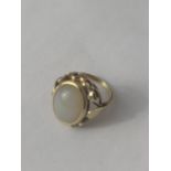 A 14CT GOLD WHITE QUARTZ CABOCHON DRESS RING, SIZE L, WEIGHT 5.11 G, COMPLETE WITH PRESENTATION BOX