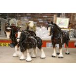 THREE LARGE CERAMIC SHIRE HORSE FIGURES WITH HARNESSES