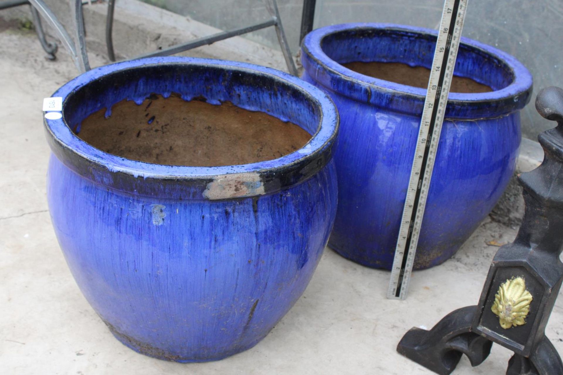 A PAIR OF CIRCULAR BLUE GLAZED POTS