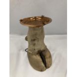 A COWS HOOF WITH COPPER ASHTRAY