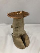 A COWS HOOF WITH COPPER ASHTRAY