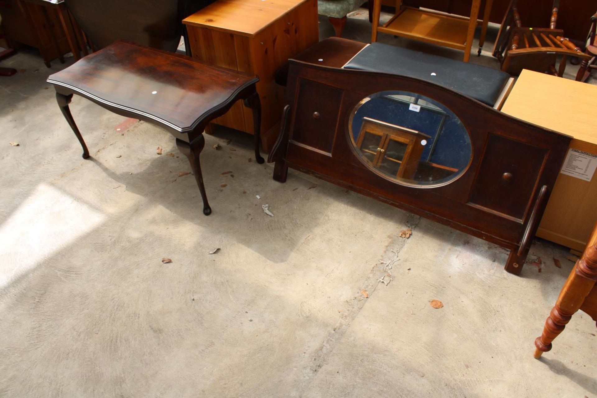 A MODERN COFFEE TABLE AND SIDEBOARD MIRROR BACK