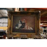 A PRINT OF FOUR KING CHARLES SPANIELS DOGS IN GILT FRAME