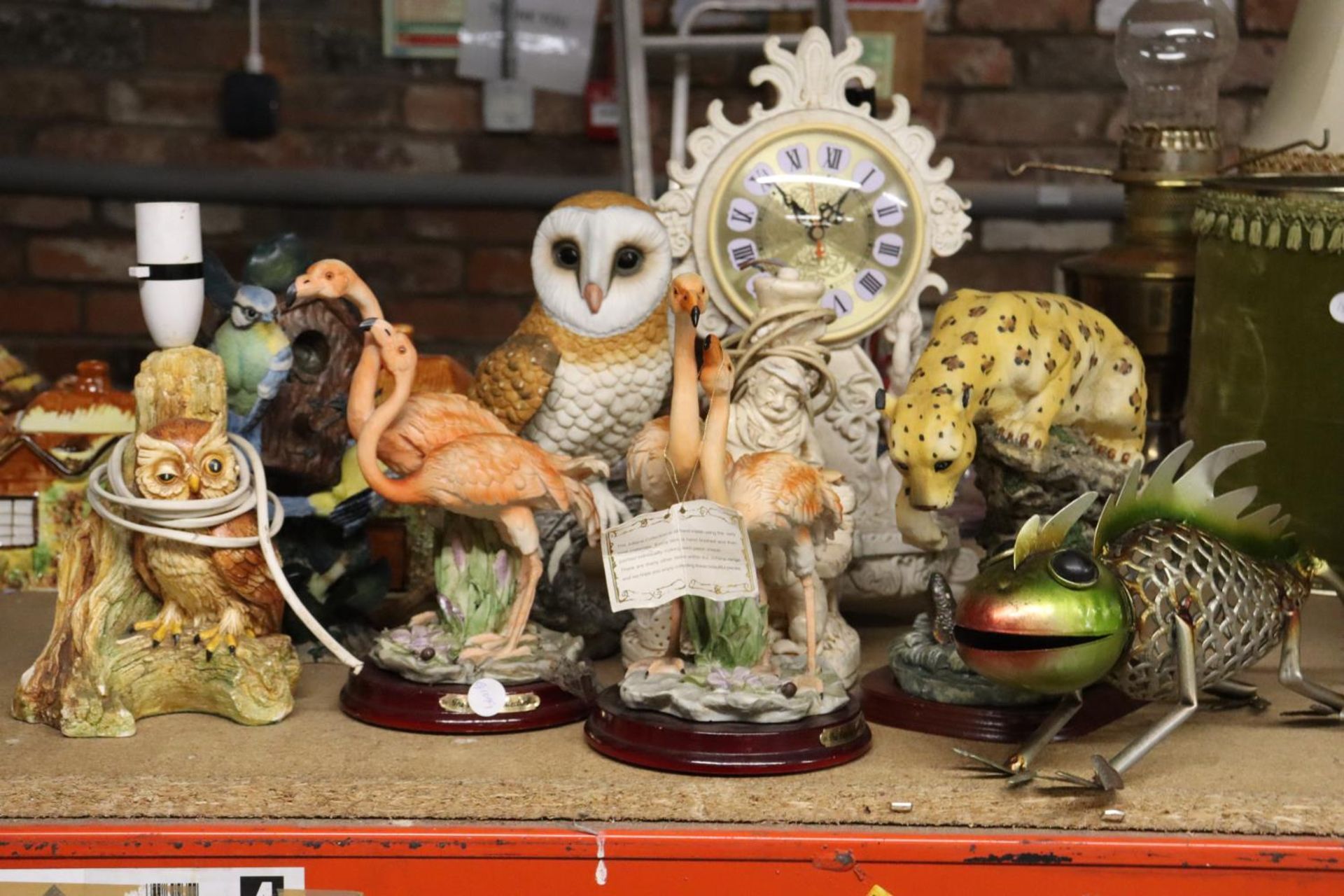 A QUANTITY OF LARGE RESIN FIGURES TO INCLUDE AN OWL LAMP, FLAMINGOES, A CHEETAH, CLOCK, ETC