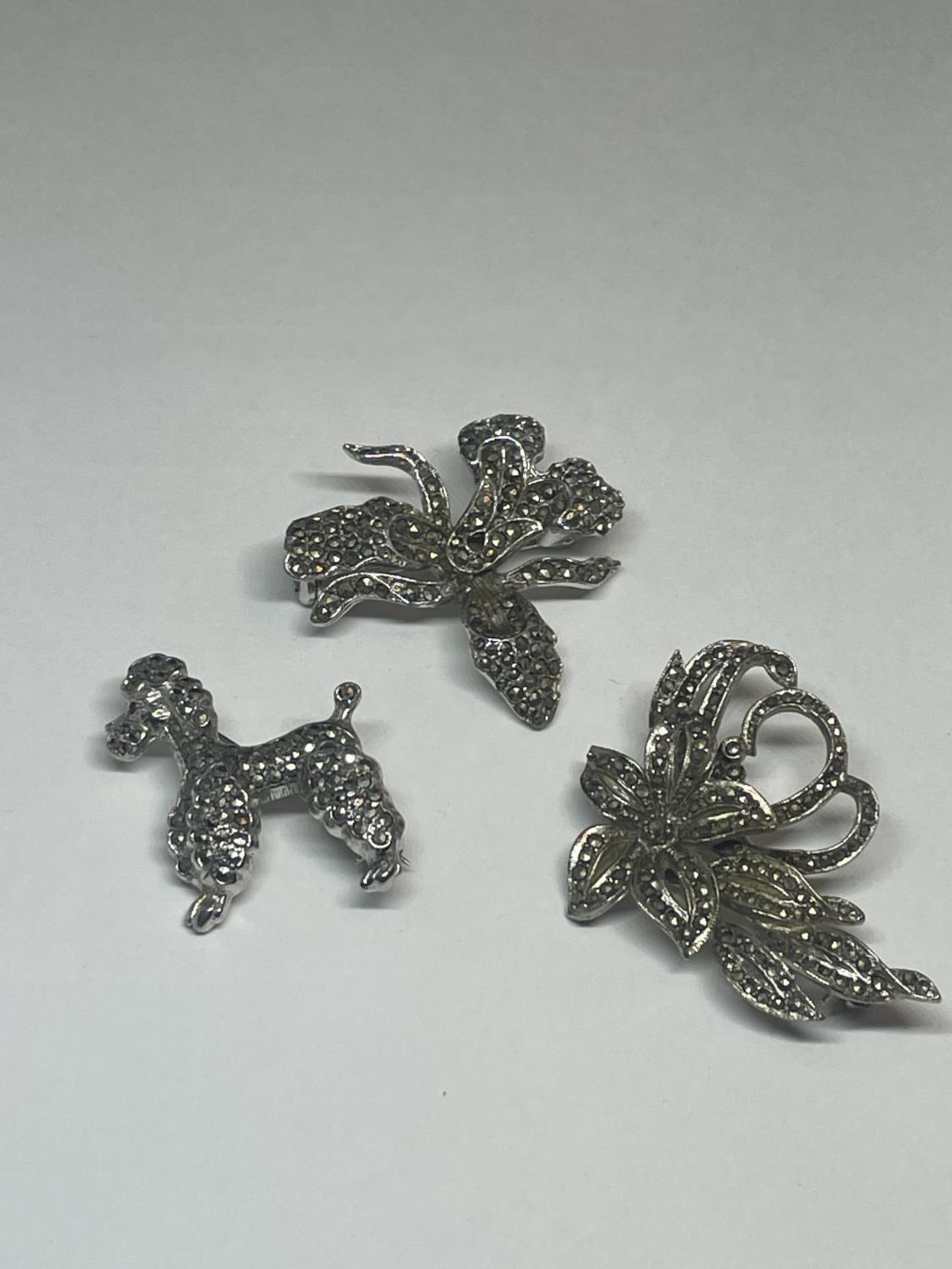 THREE MARCASITE BROOCHES