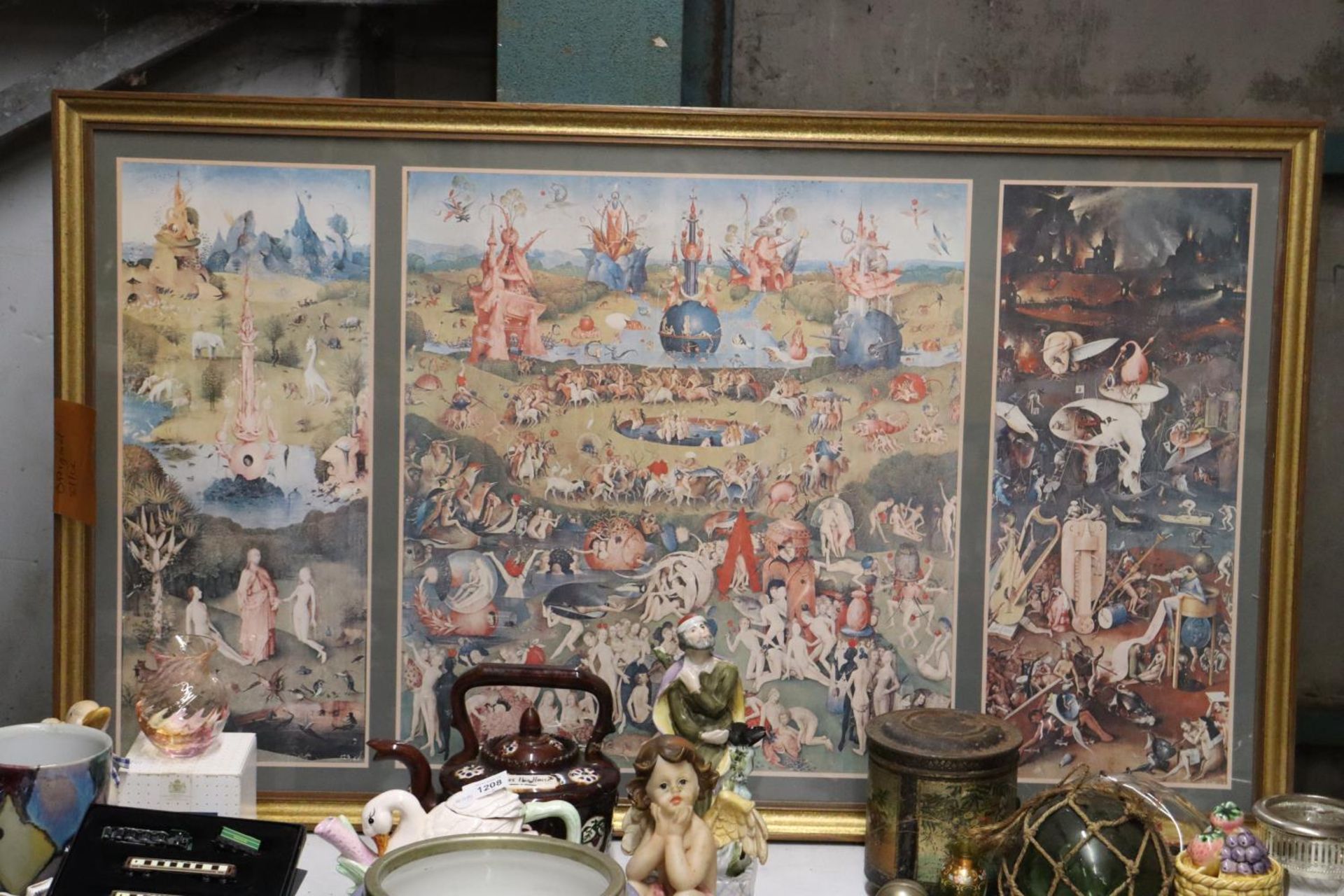 A FRAMED PRINT OF "HIRONIMUS BOSCH GARDEN OF EARTHLY DELIGHTS"