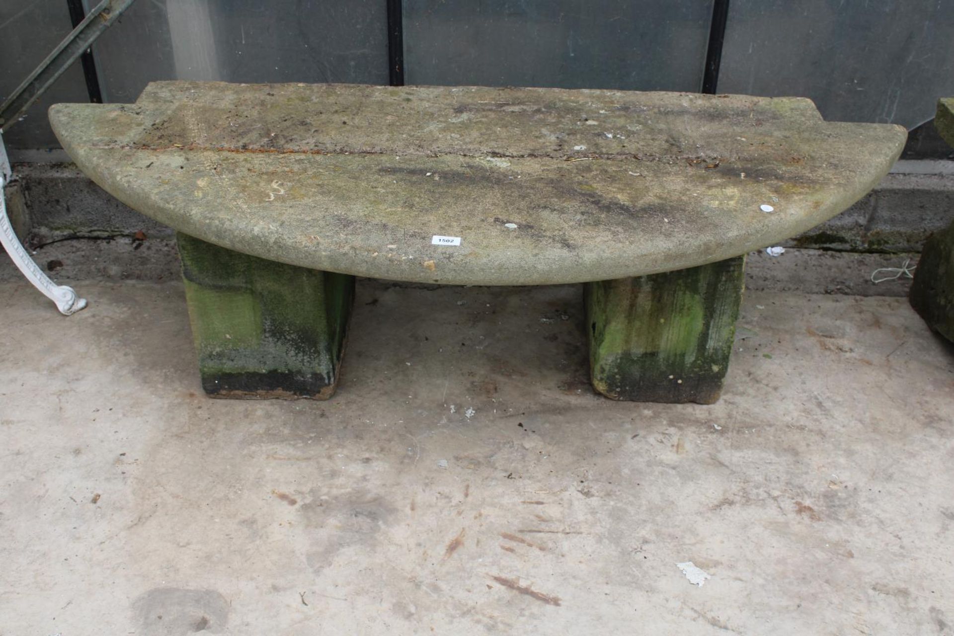 A YORK STONE BENCH WITH TWO PEDESTAL BASES (L:148CM)