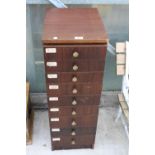 A NINE DRAWER WOODEN WORKSHOP CHEST