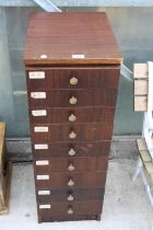 A NINE DRAWER WOODEN WORKSHOP CHEST