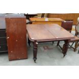 A VICTORIAN MAHOGANY WIND-OUT DINING TABLE ON TURNED AND FLUTED LEGS, 43" SQUARE (LEAF 18")