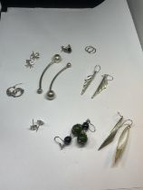 NINE PAIRS OF SILVER EARRINGS