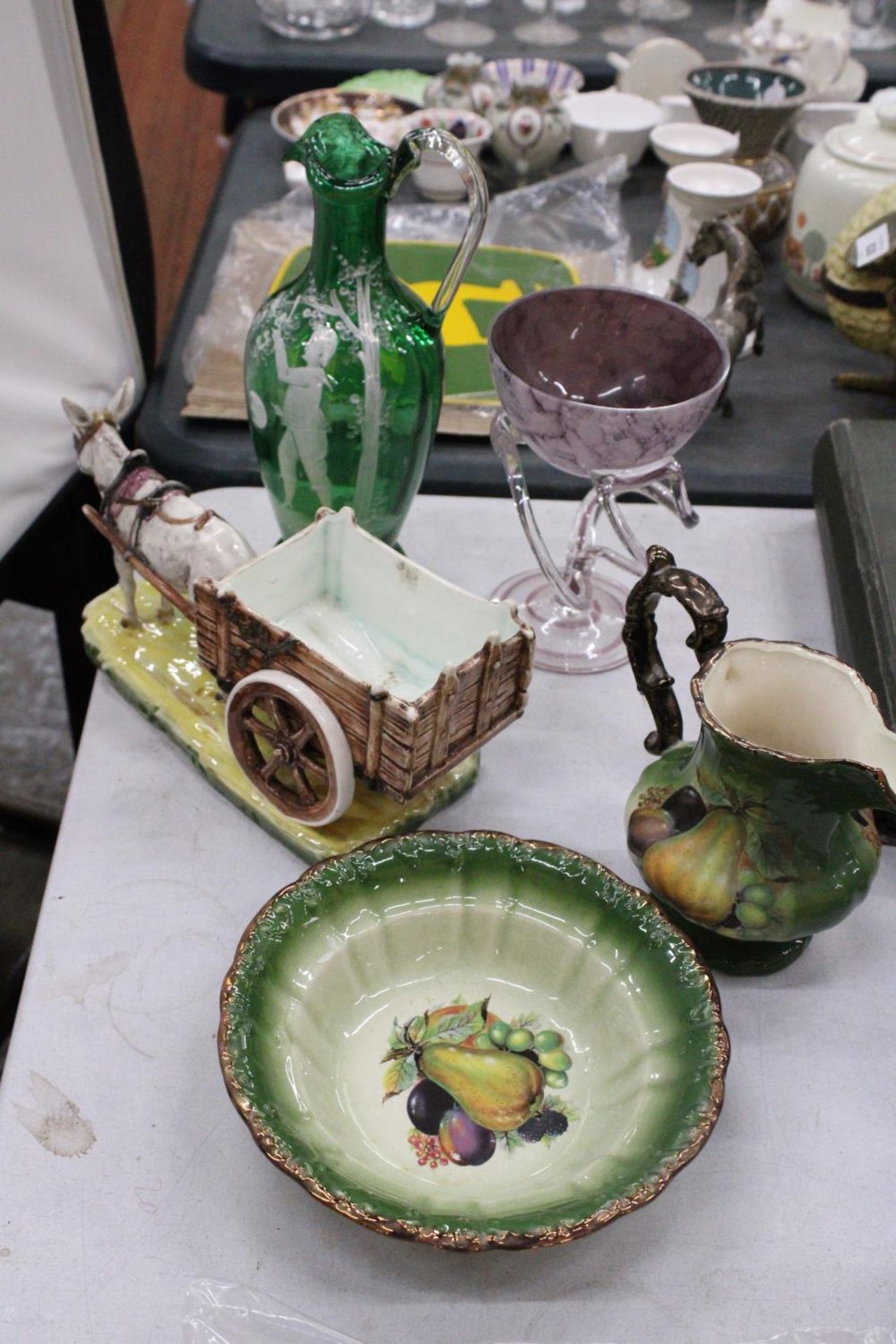 A VINTAGE GREEN MARY GREGORY JUG - A/F, A PIECE OF ART GLASS, CERAMIC DONKEY AND CART PLUS A FRUIT