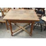 A CONTINENTAL MID 20TH CENTURY DINING TABLE WITH SINGLE DRAWER