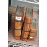 THREE WOODEN AND METAL BANDED BOXES IN THE FORM OF BOOKS