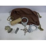 A PAIR OF HANDCUFFS WITH KEYS, COMPASS, BRASS BUCKLE ETC