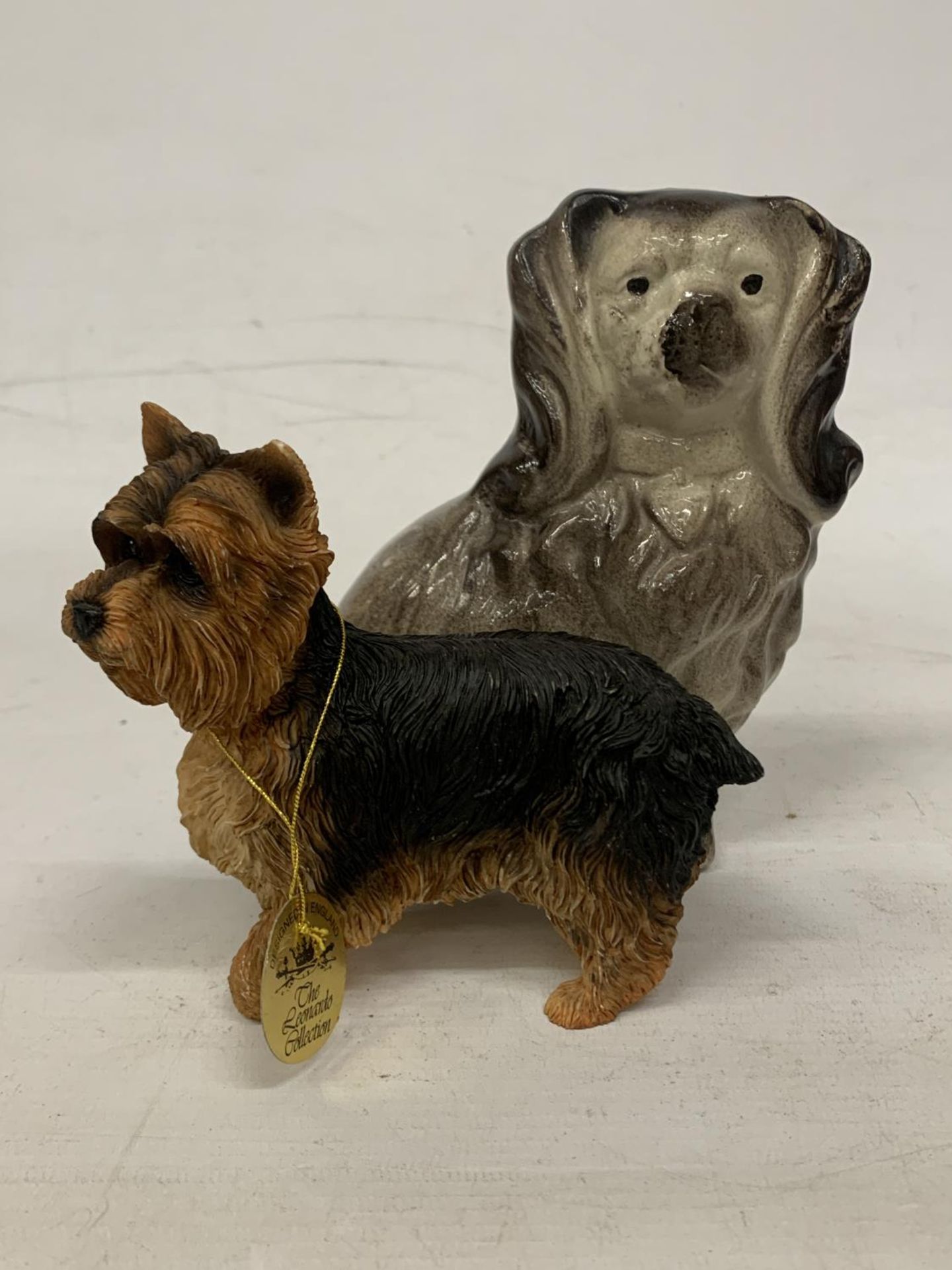 A FIGURE OF A MANTLE BLACK SPANIEL DOG AND A FURTHER LEONARD COLLECTION FIGURE OF A YORKSHIRE
